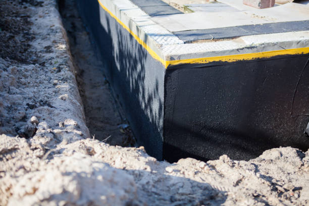 Professional Waterproofing technician working in North Chili, NY